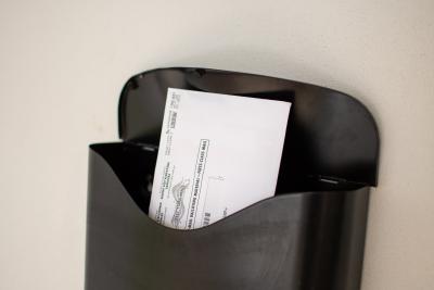 Photo of envelope in a mailbox